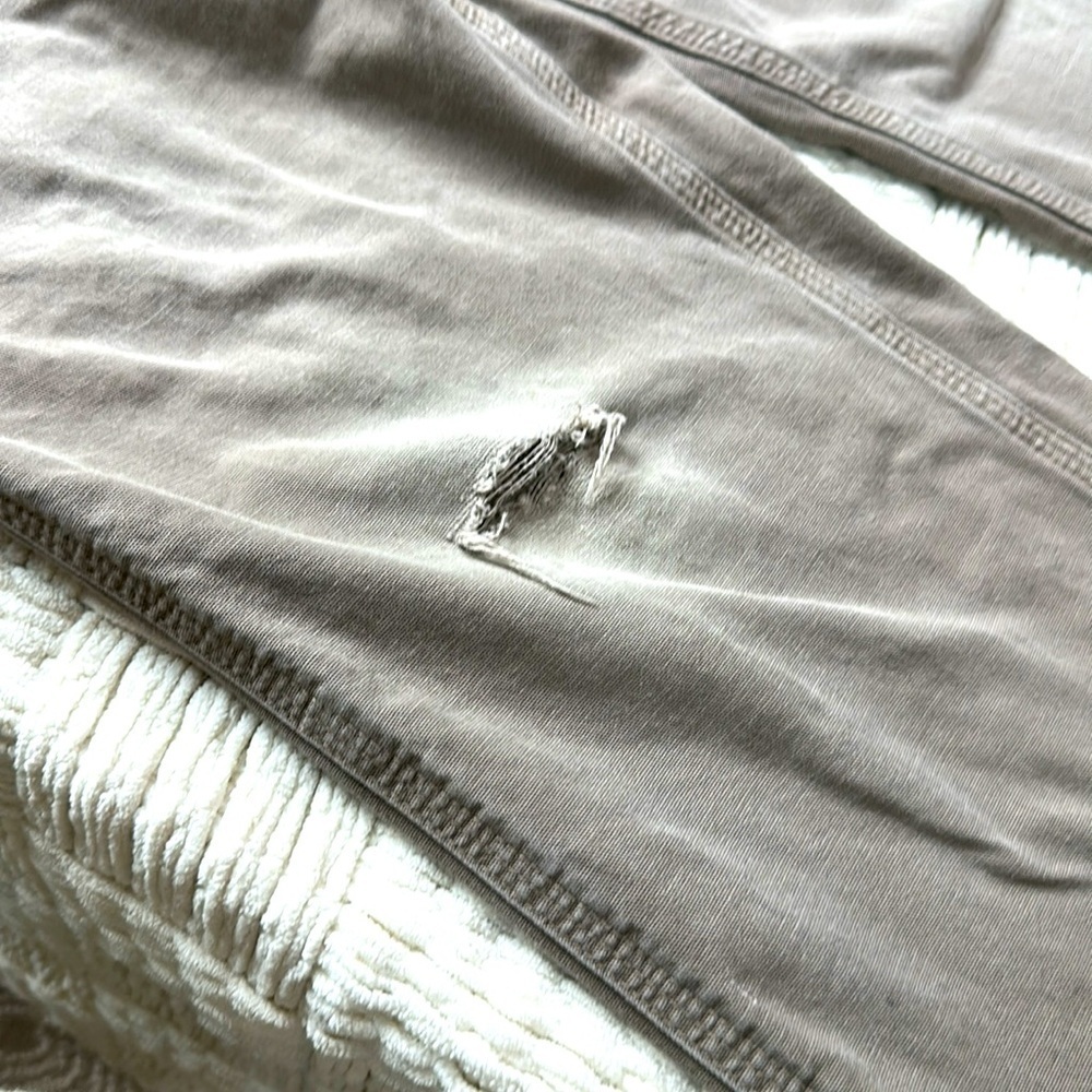 Carhartt distressed carpenter pants with some stains and holes. #10015 - Picture 2 of 11